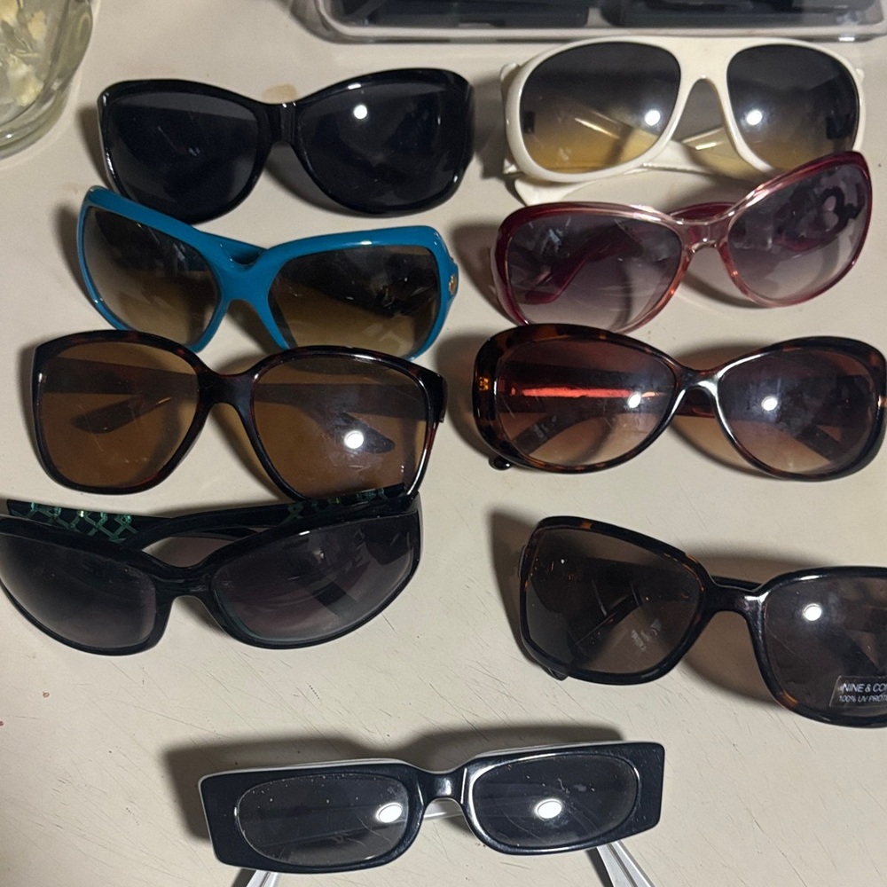 Set of 9 multi branded multicolored sunglasses make me an offer today!